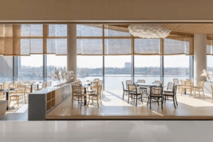 深圳寶安天琴閣原木色調(diào)田園簡(jiǎn)約風(fēng)素食館裝修案例大廳效果圖