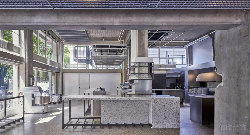 深圳寶安易尚中心灰色調(diào)工業(yè)風(fēng)披薩店裝修案例灰色水磨石操作臺