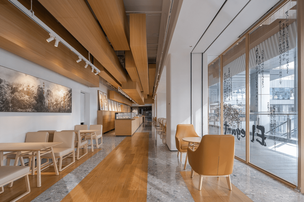 深圳南山保利文化廣場原木色調(diào)簡約自然風茶飲店裝修案例室內(nèi)雅座