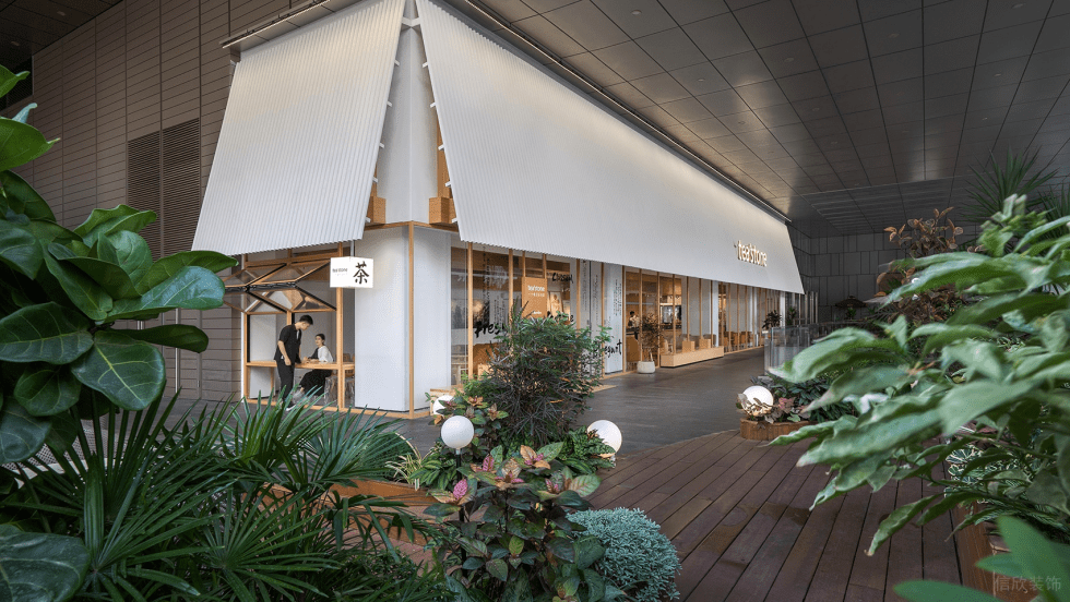 深圳南山保利文化廣場原木色調(diào)簡約自然風茶飲店裝修案例室外休閑區(qū)綠植景觀