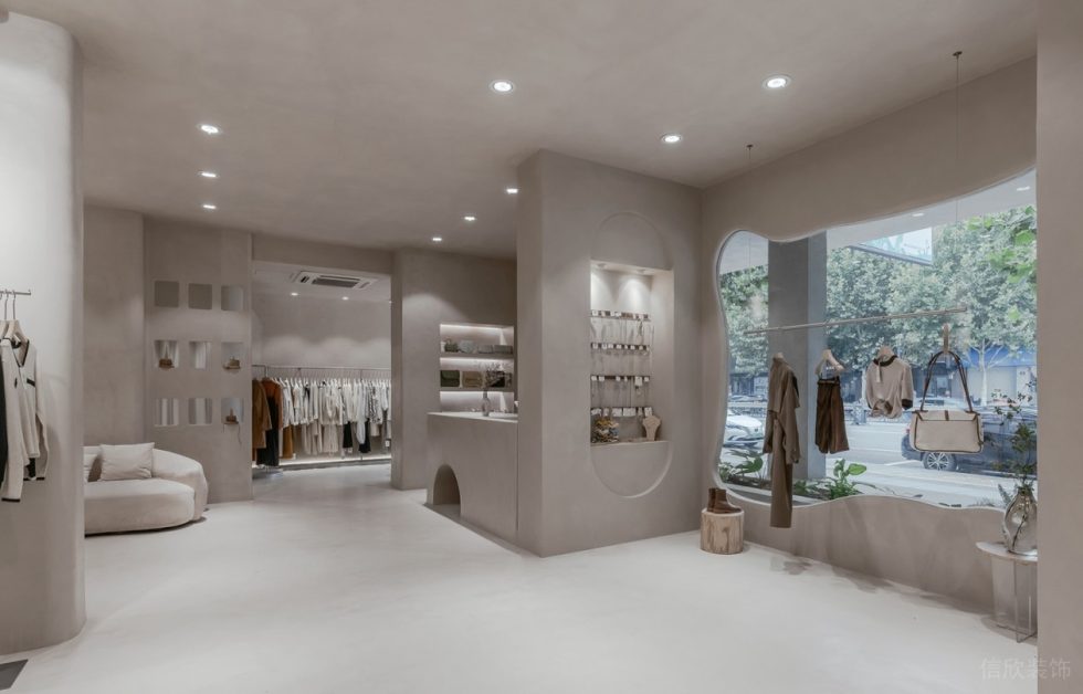 深圳市南山區(qū)前海現(xiàn)代風女裝店裝修設計淺色水泥頂面