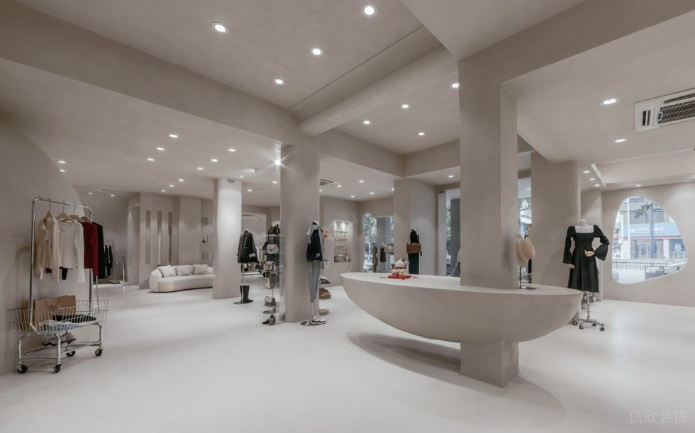 深圳市南山區(qū)前海現(xiàn)代風女裝店裝修設計船型展臺