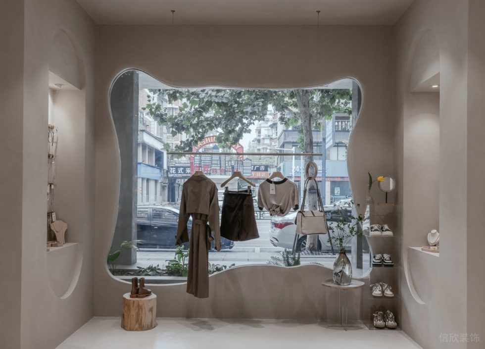 深圳市南山區(qū)前海現(xiàn)代風女裝店裝修設計造型透明玻璃墻