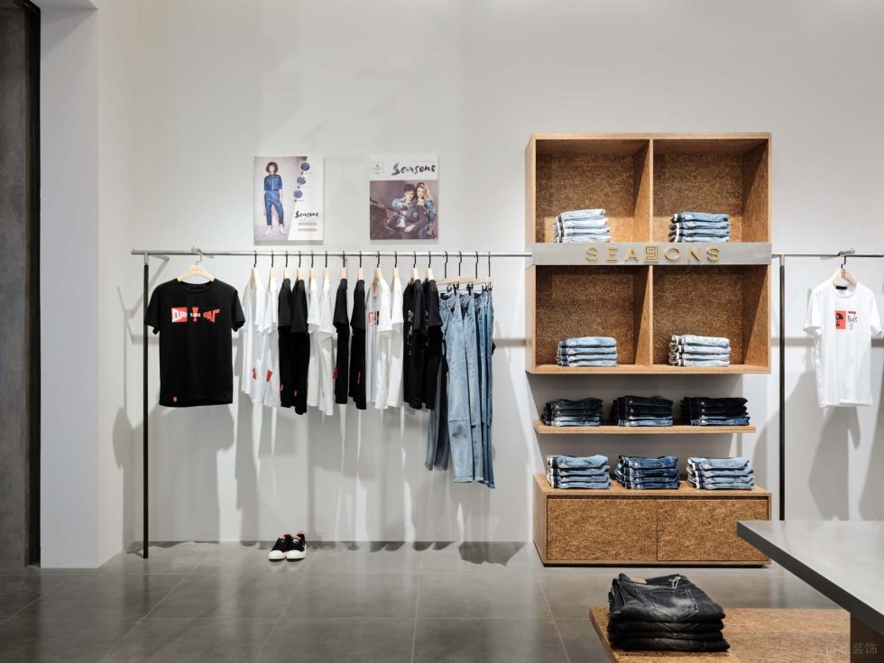 深圳市龍崗區(qū)坪地現(xiàn)代風潮牌四季牛仔店鋪墻邊服裝展架裝飾設計效果圖