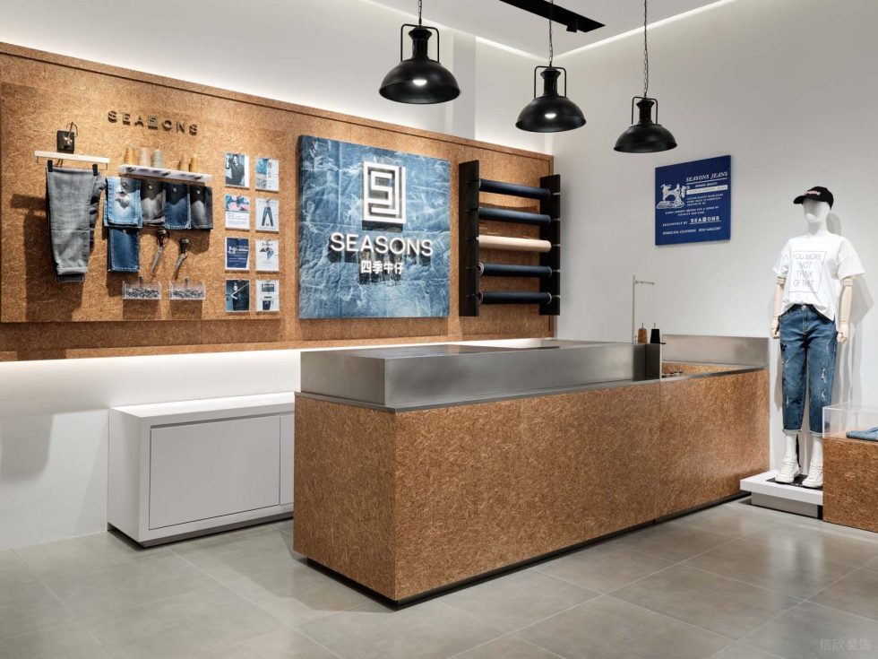 深圳市龍崗區(qū)坪地現(xiàn)代風潮牌四季牛仔店鋪前臺形象墻裝飾設計效果圖