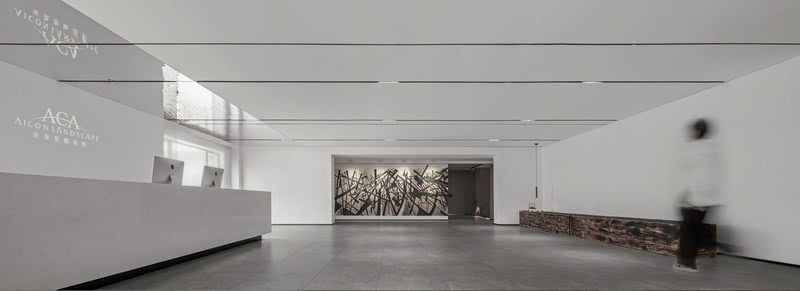 白色主調現代極簡主義風格辦公室裝修設計 前臺區(qū)域側面圖