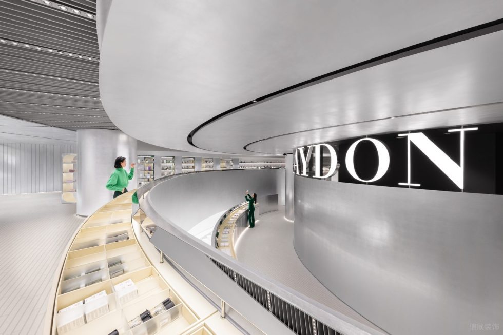 深圳市福田區(qū)景田現(xiàn)代風(fēng)美妝旗艦店裝修設(shè)計效果圖弧形展臺