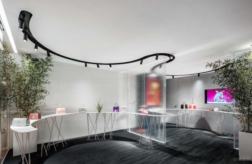 深圳市福田中心區(qū)現(xiàn)代風(fēng)皮革藝術(shù)形象店裝修設(shè)計-半圓弧藝術(shù)展臺