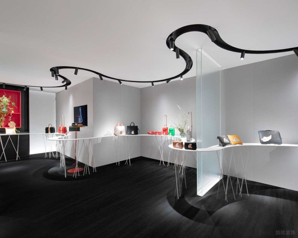 深圳市福田中心區(qū)現(xiàn)代風(fēng)皮革藝術(shù)形象店裝修設(shè)計-黑色棉麻地毯