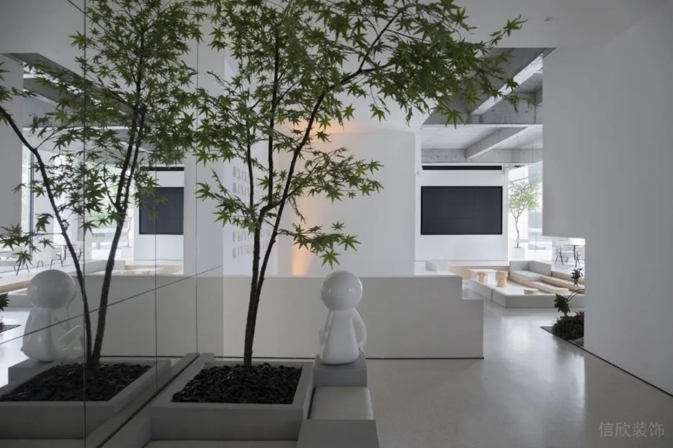 現(xiàn)代簡約風辦公室裝修設(shè)計 休息區(qū)入口綠植