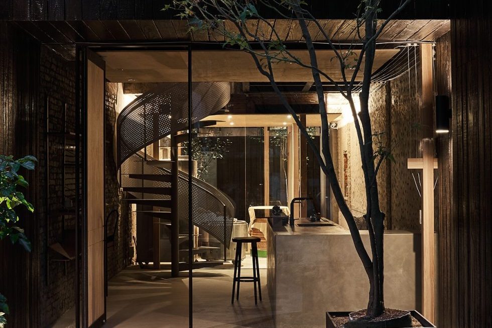 工業(yè)風茶室入口處裝修圖