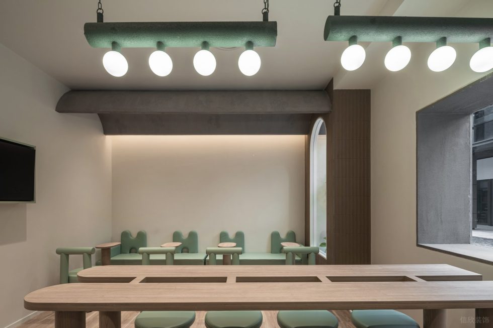現(xiàn)代簡約風(fēng)飲品店綠色吊燈照明裝修設(shè)計
