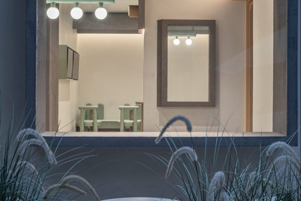 現(xiàn)代簡約風(fēng)飲品店梯形窗戶裝修設(shè)計