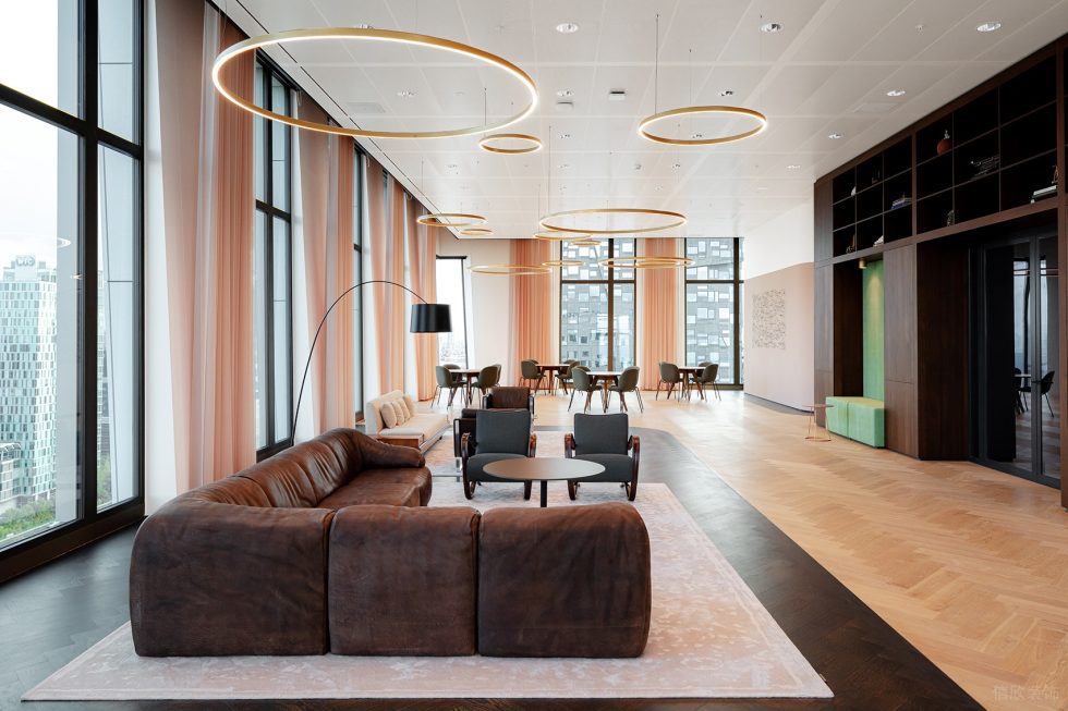 深暖色現(xiàn)代簡約風辦公室裝修設計暖色調(diào)休閑廳