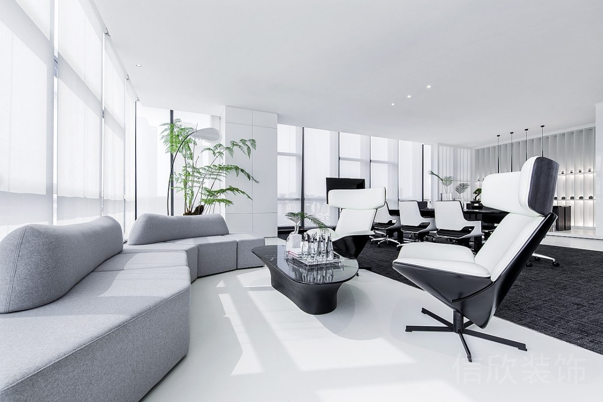 總裁辦公室會客區(qū)弧形布藝沙發(fā)裝修效果圖