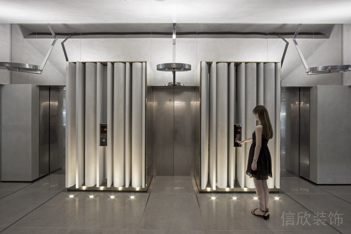 銀色金屬條紋電梯等待區(qū)裝修設計辦公室休息區(qū)