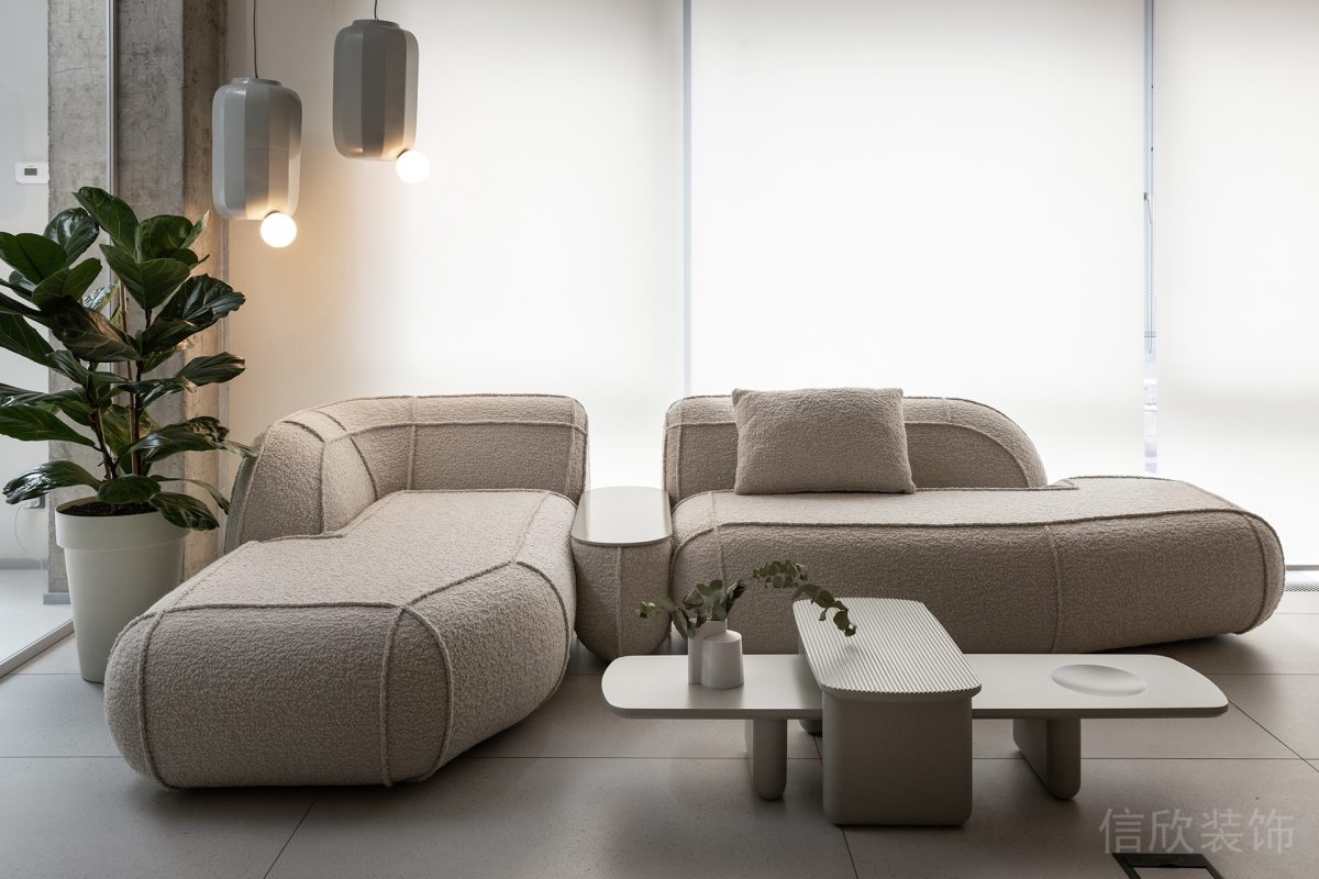 白色磨毛布藝沙發(fā)l型沙發(fā)樣板間辦公室裝修設計圖