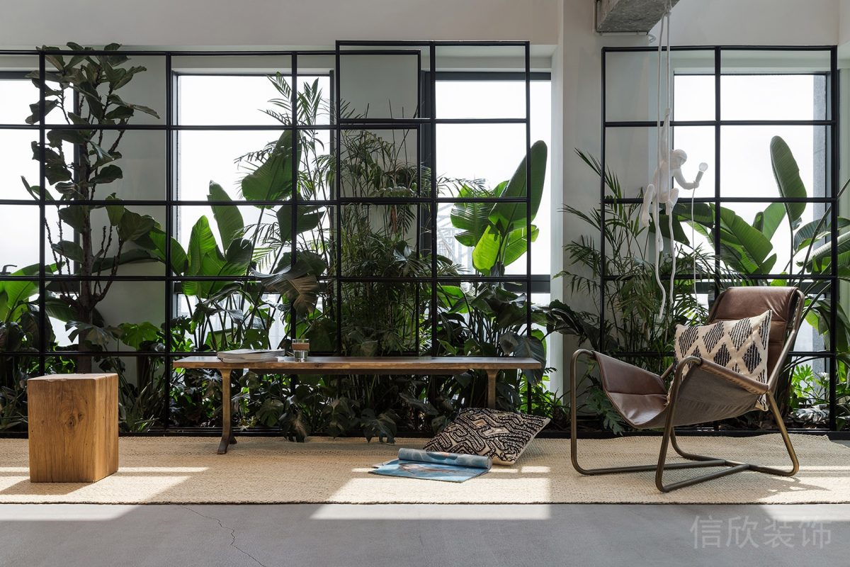 綠色金屬鏤空玻璃墻體設(shè)計(jì)裝修茶幾休息區(qū)裝修圖