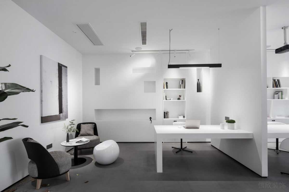 洽談區(qū)辦公室裝修黑白色調(diào)設(shè)計(jì)書桌效果工作區(qū)裝修